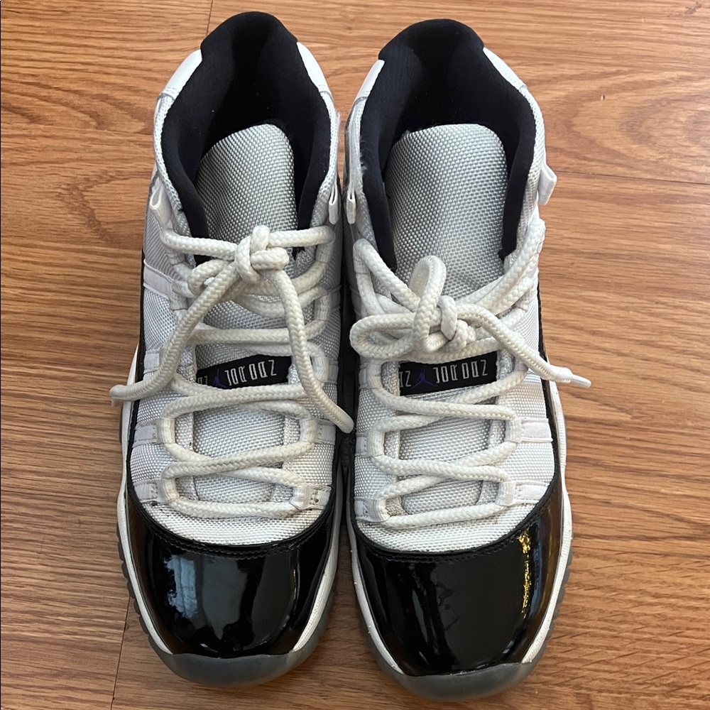 Jordan 11 Retro Concord Black and White Sneakers